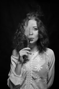 Woman smoking  electronic cigarette